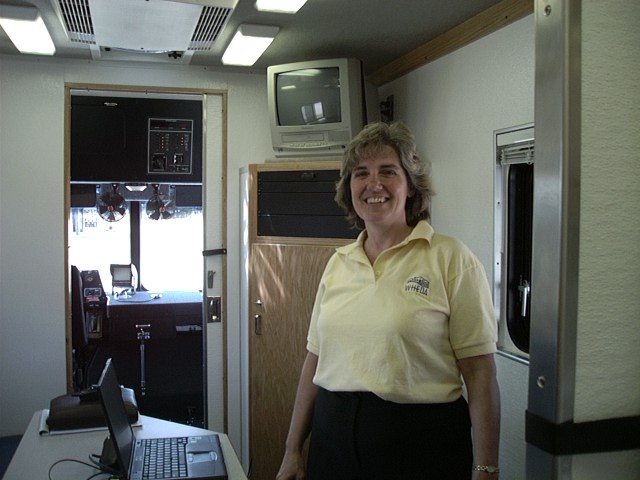 Woman in mobile vehicle