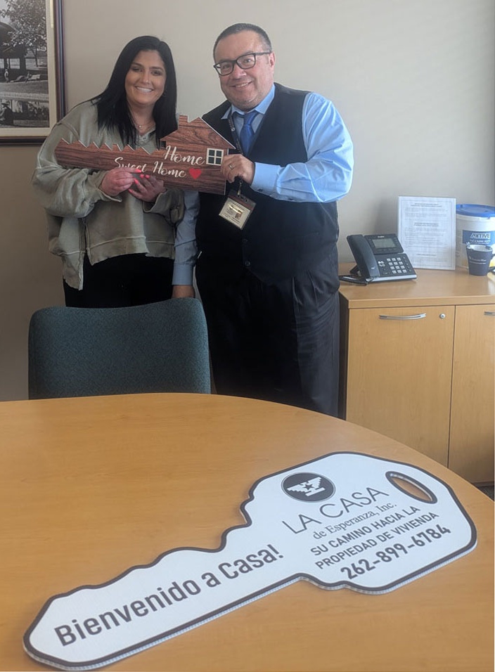 Family getting a key to thier house